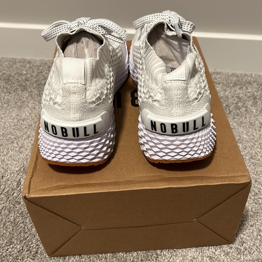 Brand new. Never worn. Size 7.5 Reg. $159